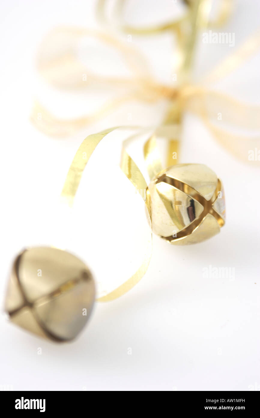 gold bells on ribbon Stock Photo - Alamy