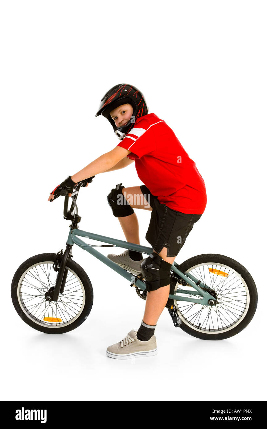 Happy boy in helmet on BMX and looking at camera Side view Isolated on  white background Stock Photo - Alamy