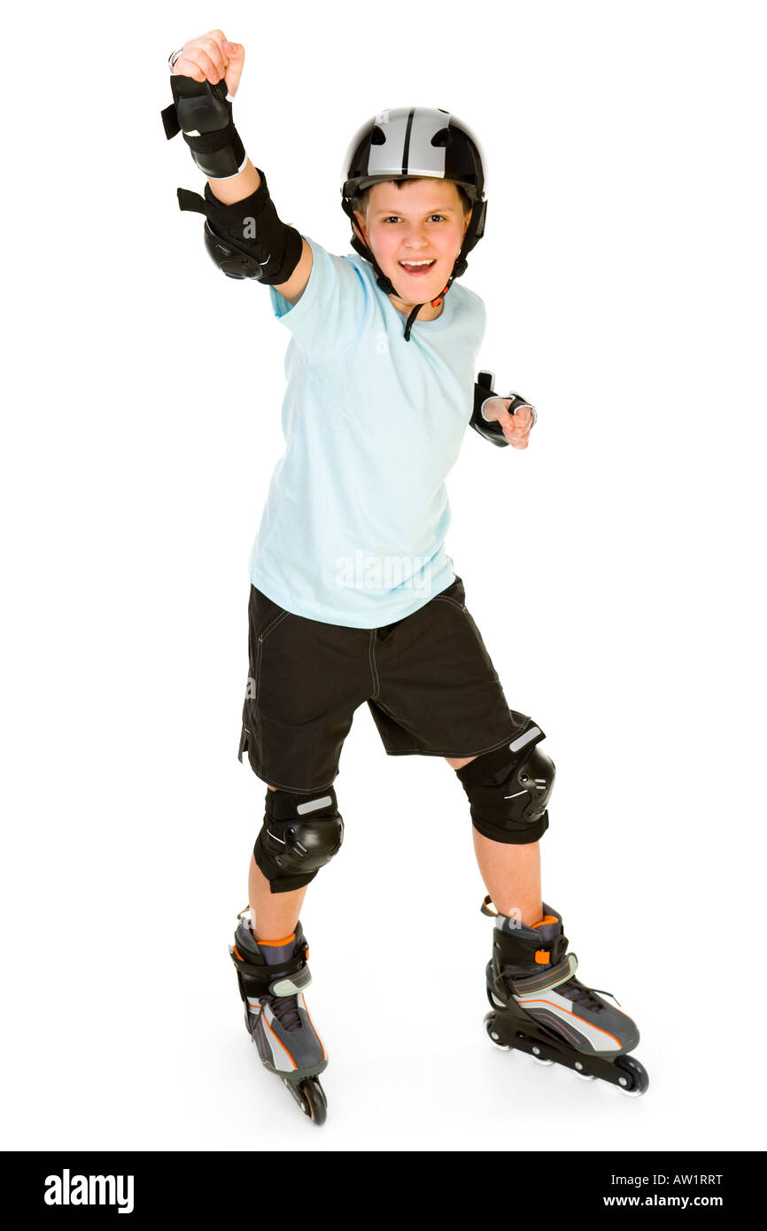 Young happy roller boy in protection kit standing with hand up and looking  at camera Front view Isolated on white background Stock Photo - Alamy