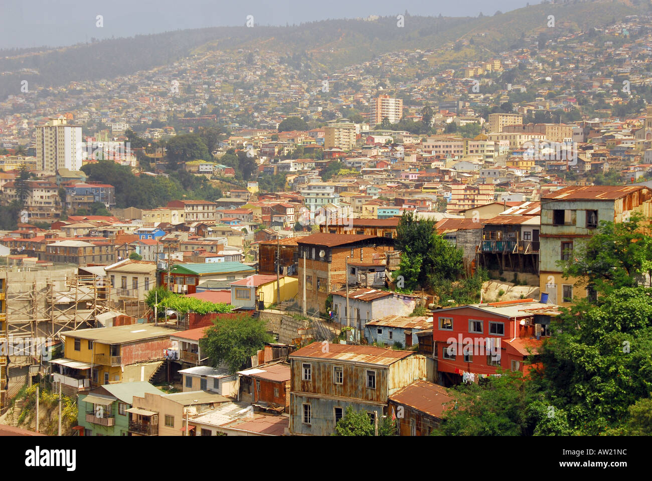 Chile Valparaiso hillside homes packed together overcrowding poverty limited land space Stock Photo
