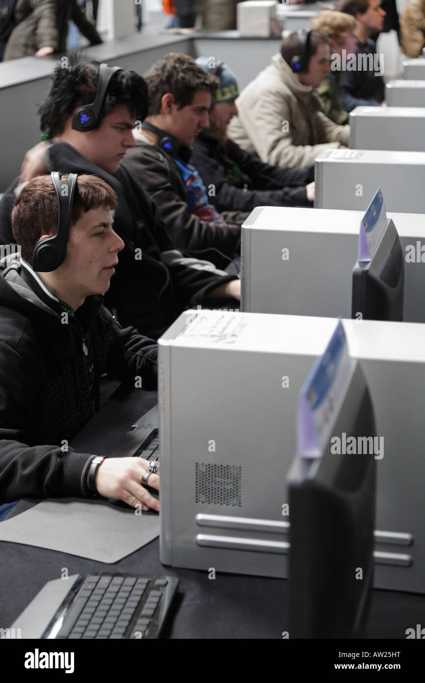 Teenagers playing computer games - LAN Party - network game Stock Photo