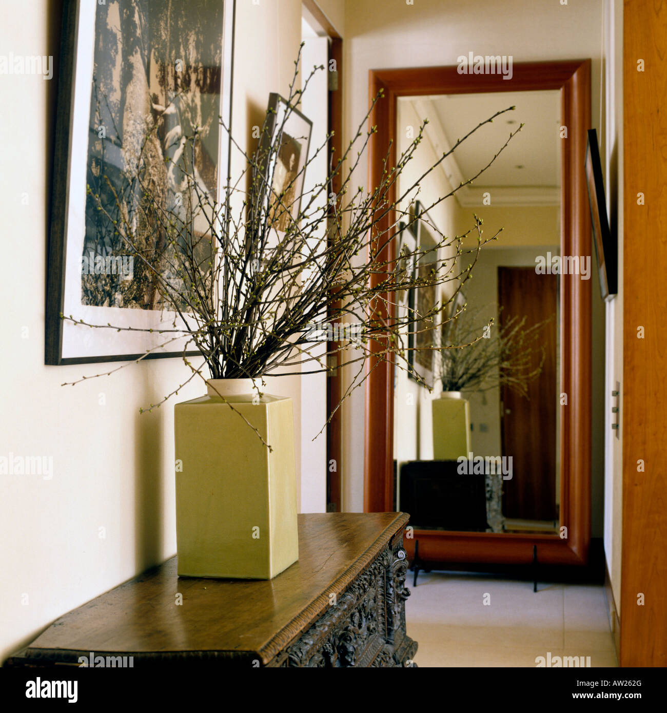 Hallway With Large Floor Standing Mirror And Arrangement Of Willow