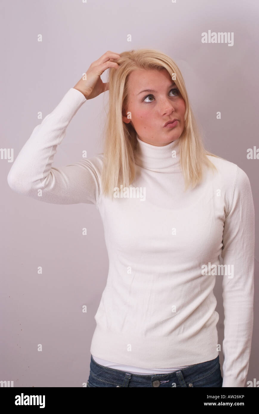 Pensive young woman | nachdenkliche junge blonde Frau Stock Photo