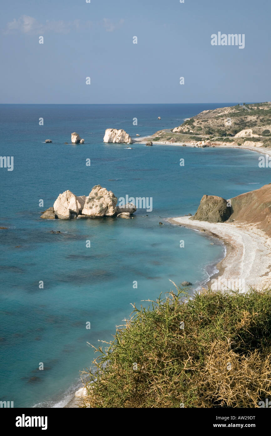 Aprohdities Rock Cyprus coastal landscape. This large rock marks the birthplace of the Greek goddess Aphrodite who emerged from the sea. Stock Photo