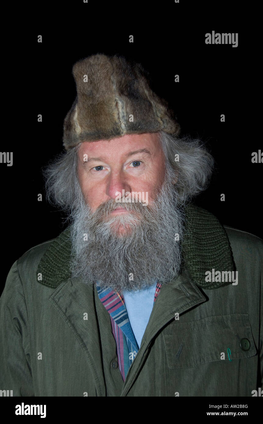 Elderley Slovenian Man Wearing A Hat Made From The Skins Of Edible elderley-slovenian-man-wearing-a-hat-made-from-the-skins-of-edible