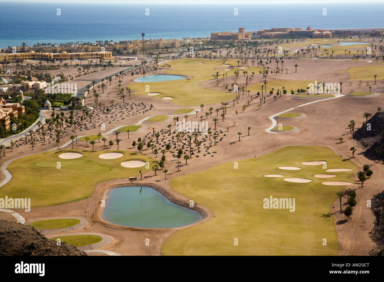 Aerial view of professional 18 hole golf course and hotels in resort village on Red Sea. Taba Heights Sinai Peninsula Egypt Stock Photo