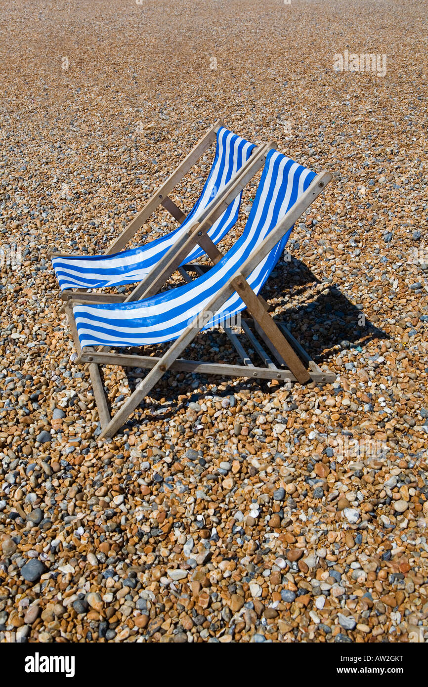 Deck chairs on Pebble Beach Stock Photo Alamy