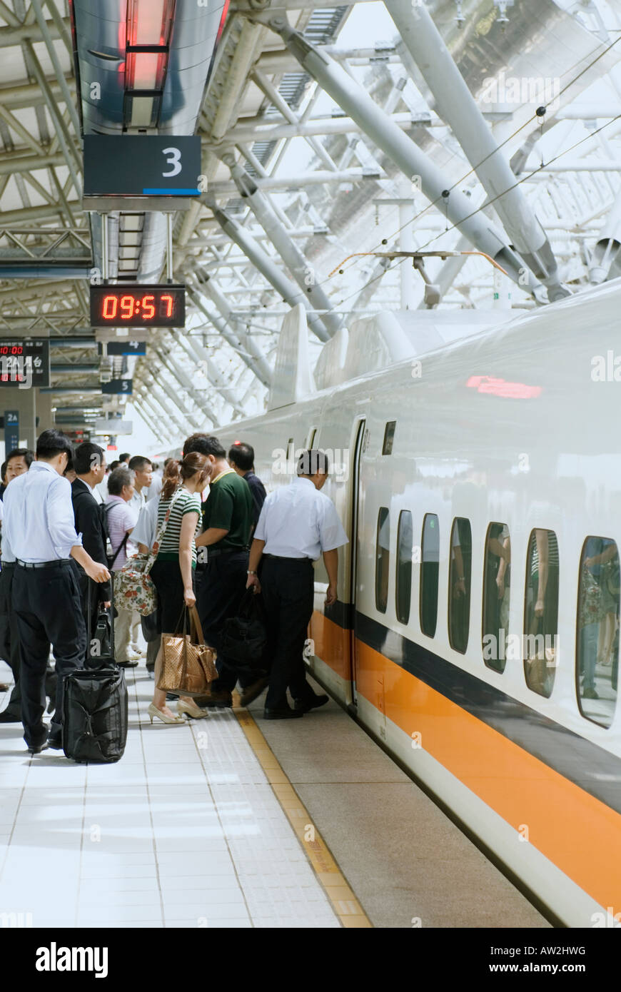 Passengers Boarding High Speed Bullet Train, Taiwan, China Stock Photo