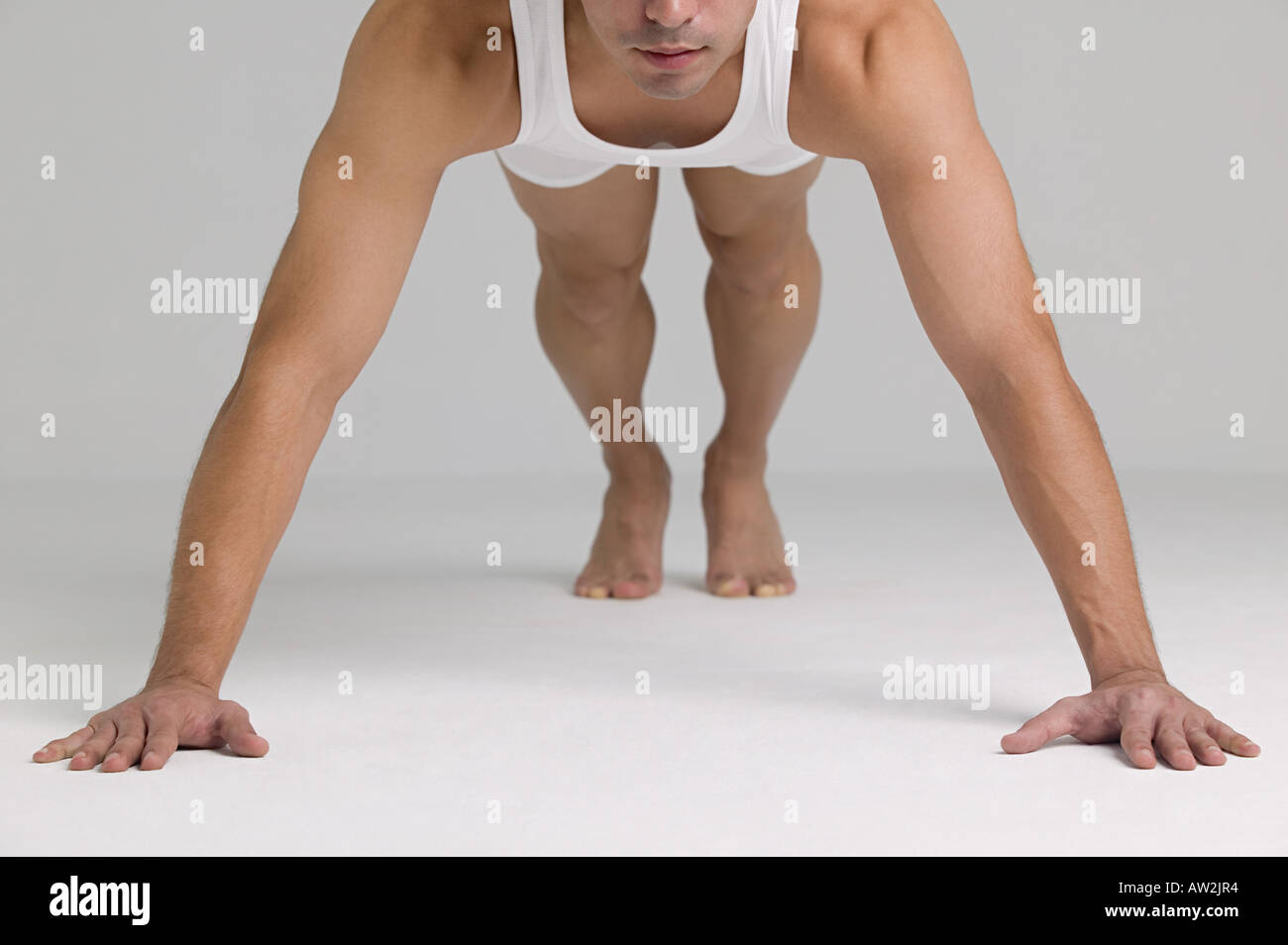 Man doing push ups Stock Photo