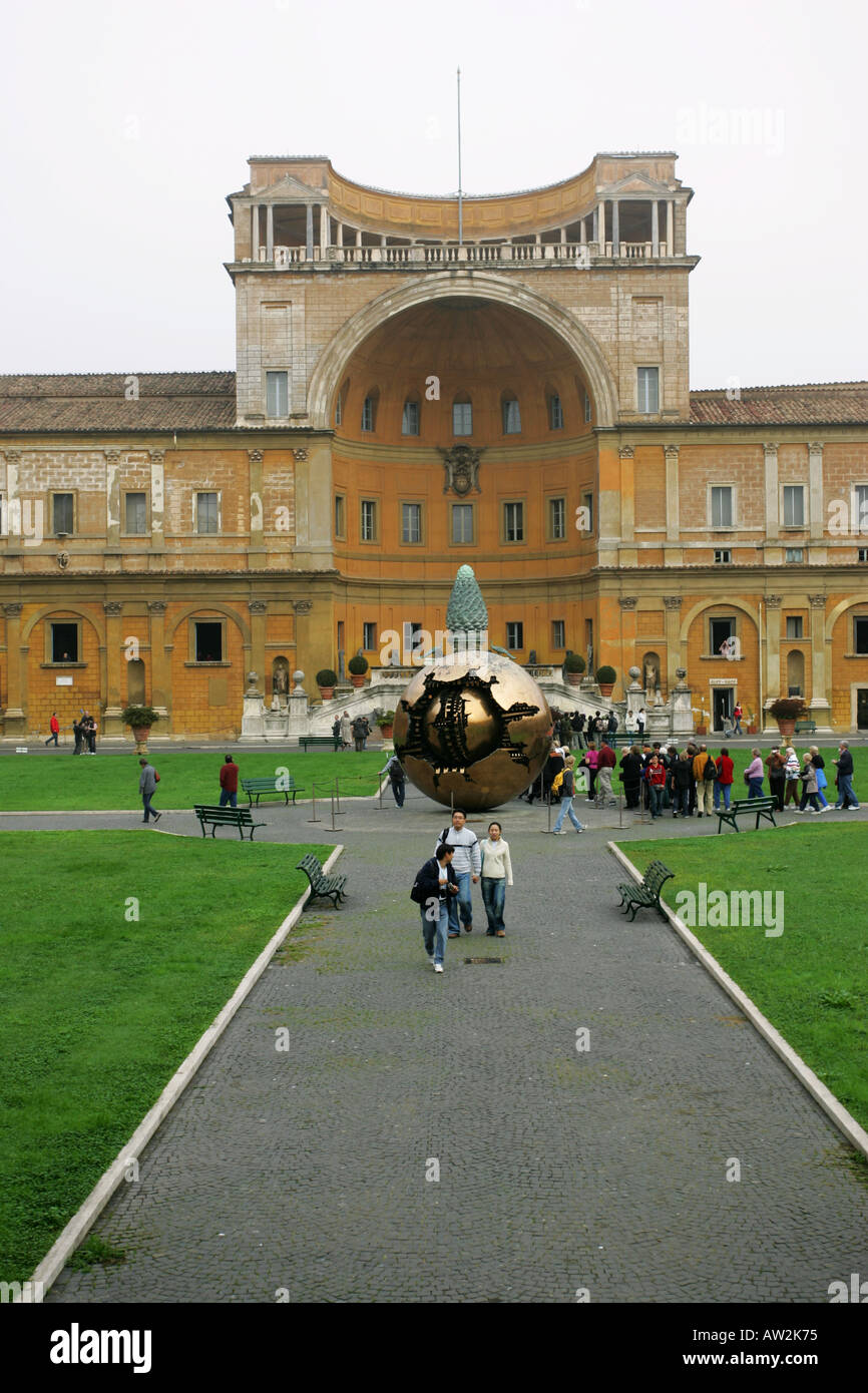Sfera Conserva sculpture surrounded  sightseeing tourists the Vatican City Museums courtyard Rome Italy Europe The Sfera Conserv Stock Photo