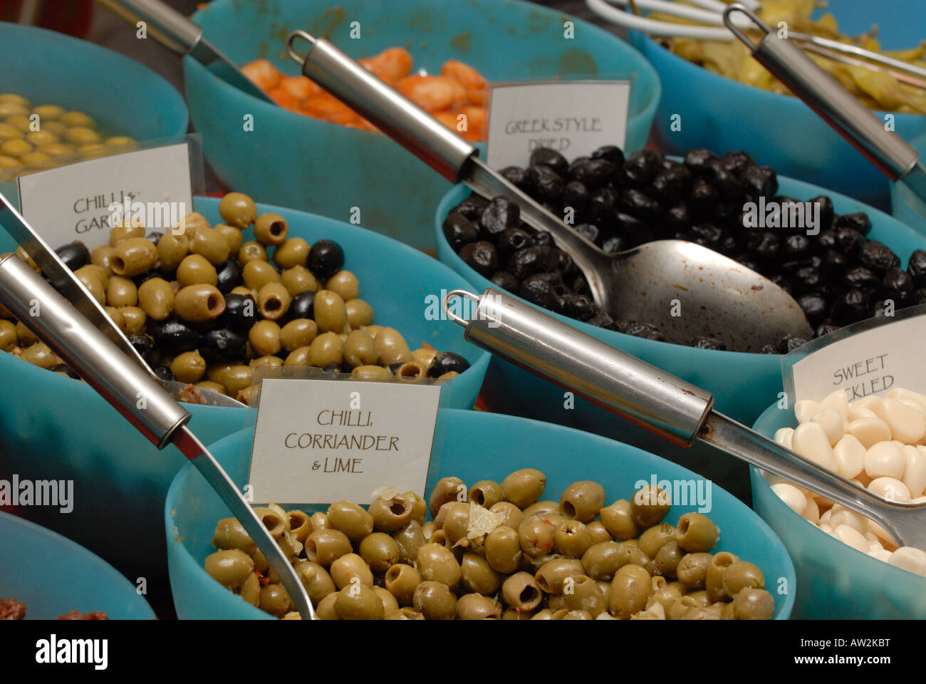 olives of different varieties on sale at a Spanish or greek market oily