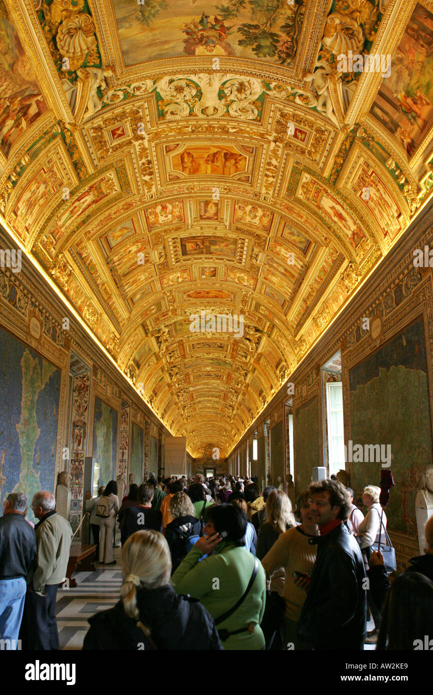 Tourists view the large antique maps in the Map Gallery, Vatican Museum Rome Italy European destination Stock Photo