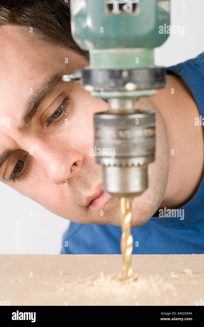 Man drilling Stock Photo
