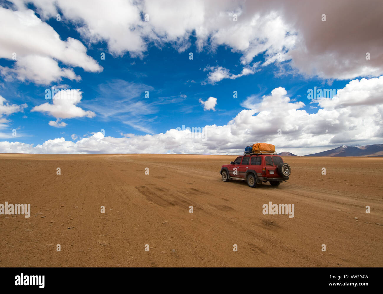 desert road white clouds and deep blue sky Stock Photo - Alamy