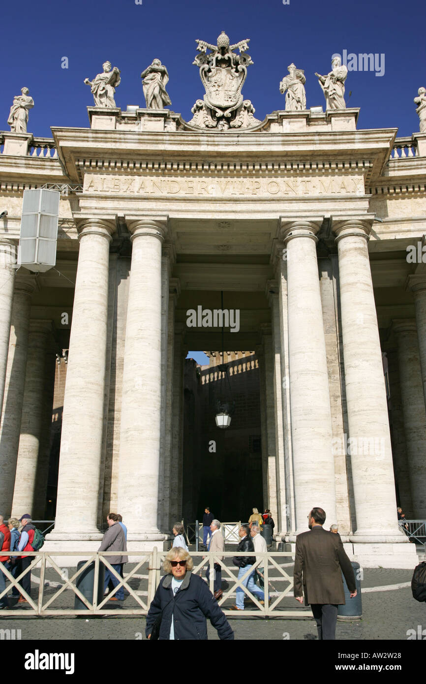 Tourists explore the Corinthian columns white pillars of St Peters ...