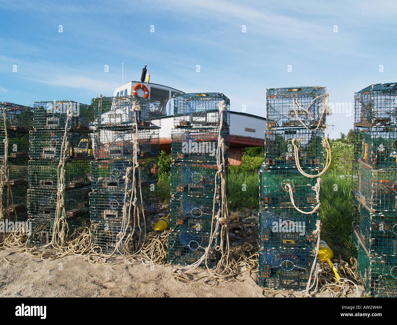 Lobster boat and traps Stock Photo Alamy
