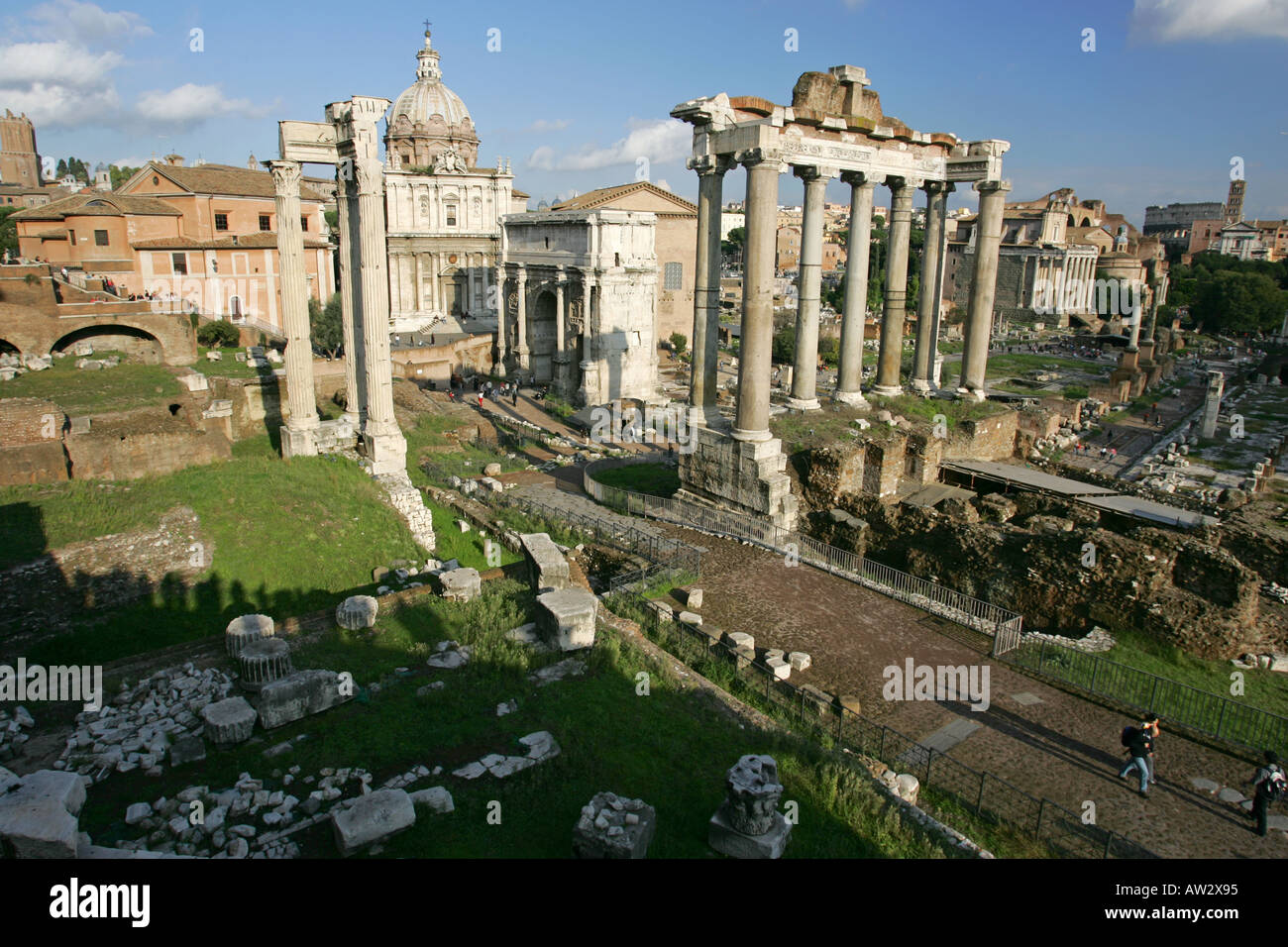 The Imperial Roman Forum ruins remains with the Corinthian Columbs and ...