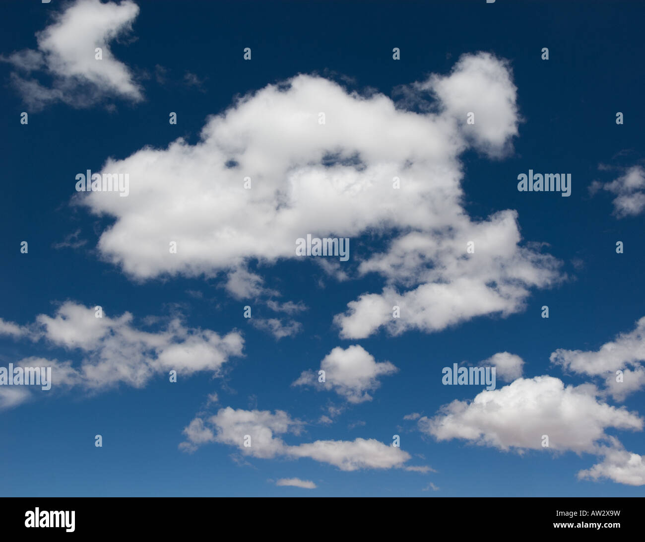 white clouds over deep blue sky background Stock Photo - Alamy