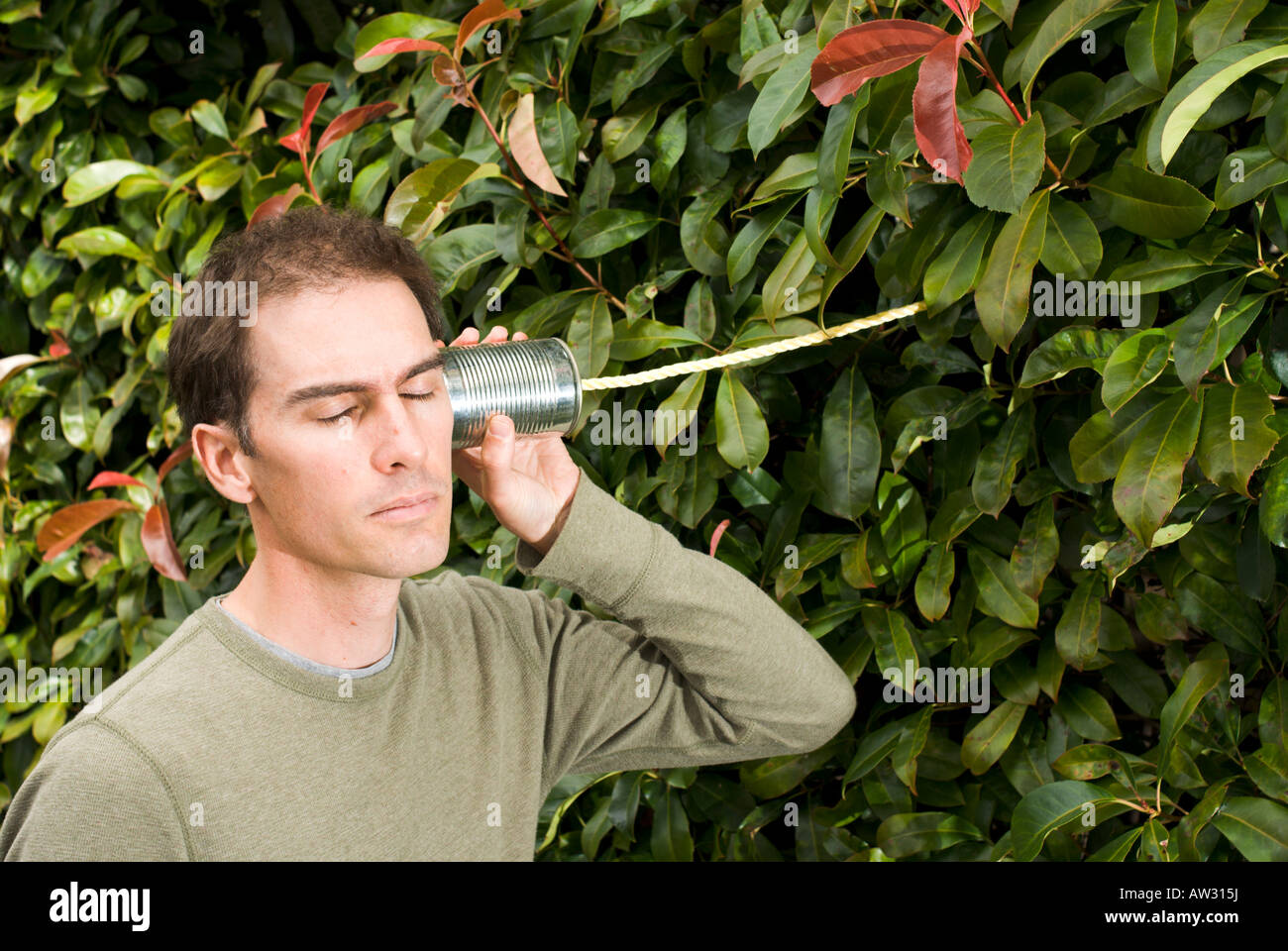 Casual young businessman listening to nature on environmental issues Stock  Photo - Alamy