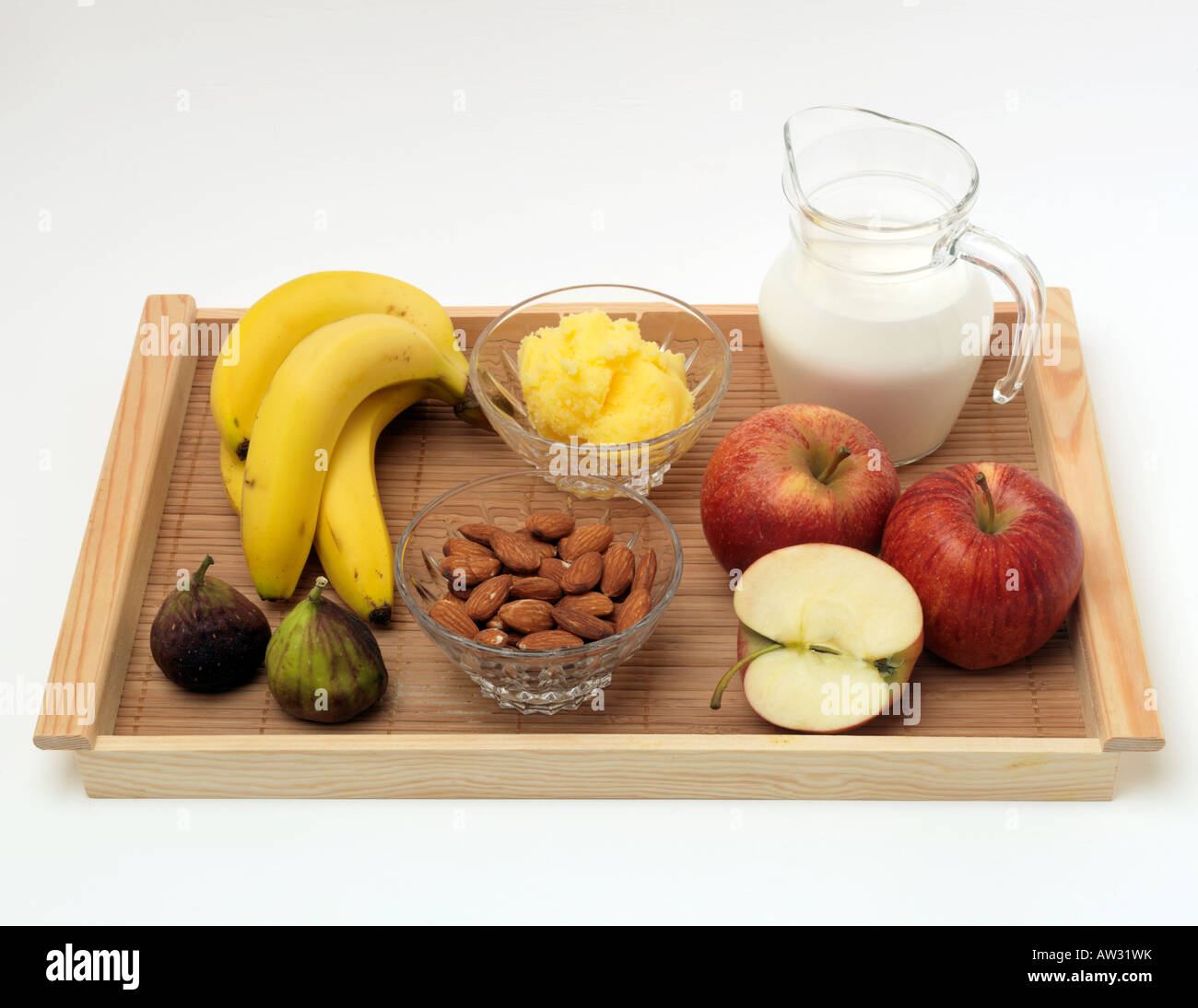 Sattva Foods Almonds Milk Ghee Figs Apples and Bananas Stock Photo