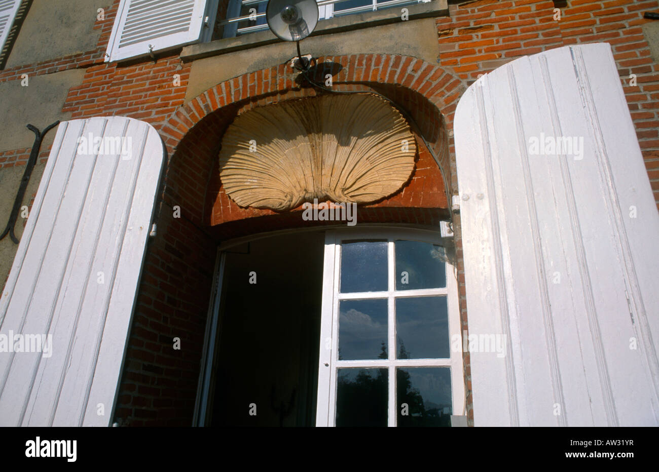 Scallop Shell as Decoration over door Chateau du Landel Rouen Normandy France Stock Photo