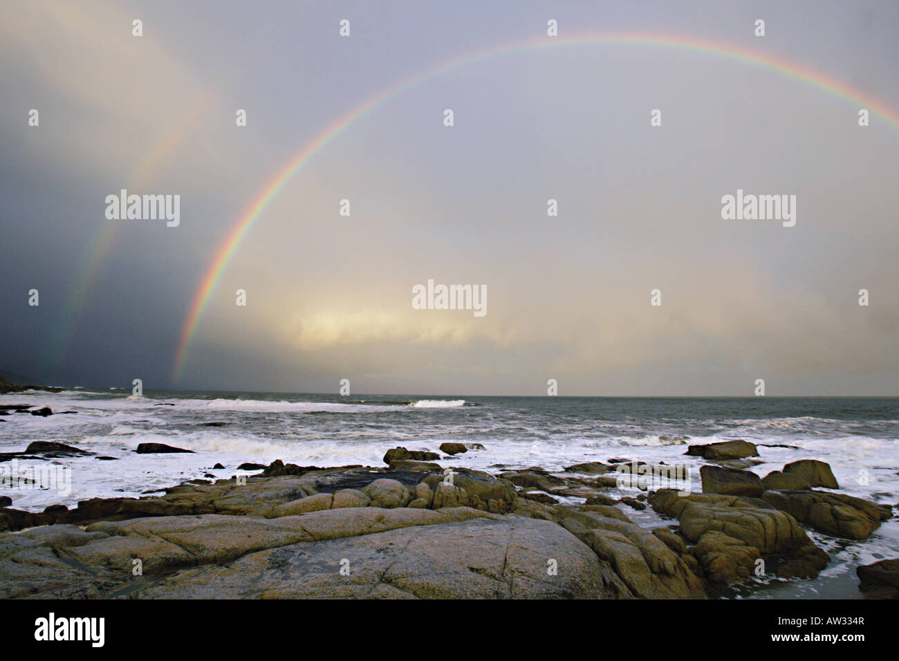 Double Rainbow over the sea Stock Photo - Alamy