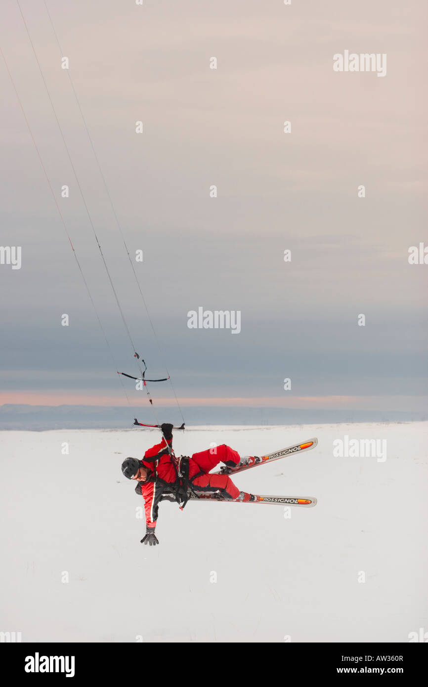 Flash lights up a man kiteskiing near Boise Idaho MR Stock Photo