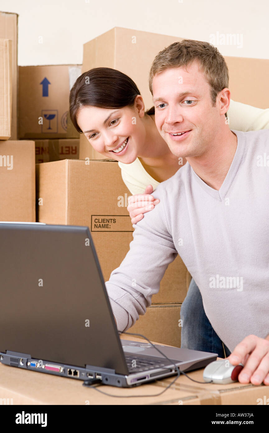 Couple looking at laptop Stock Photo