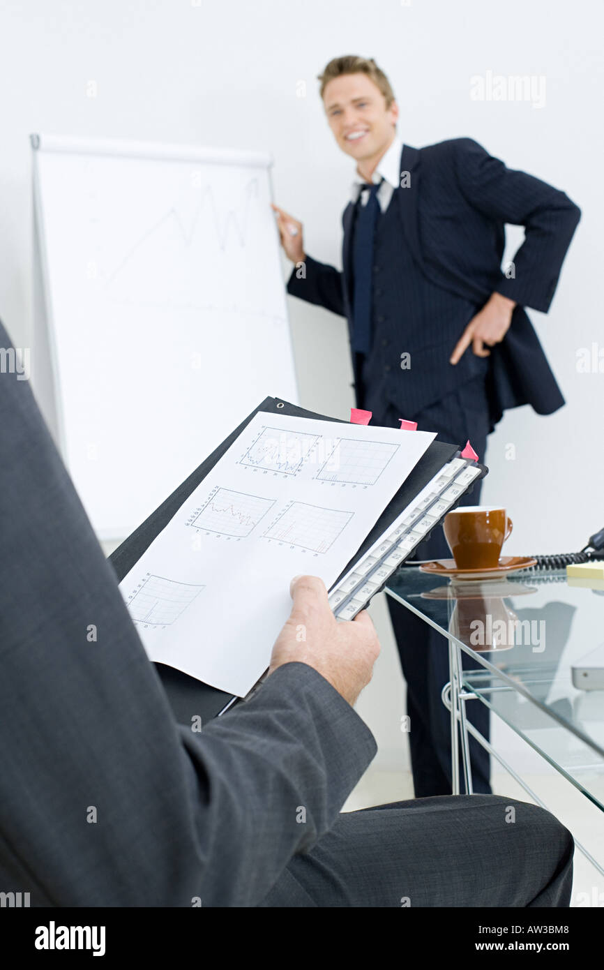 Businessman giving presentation Stock Photo