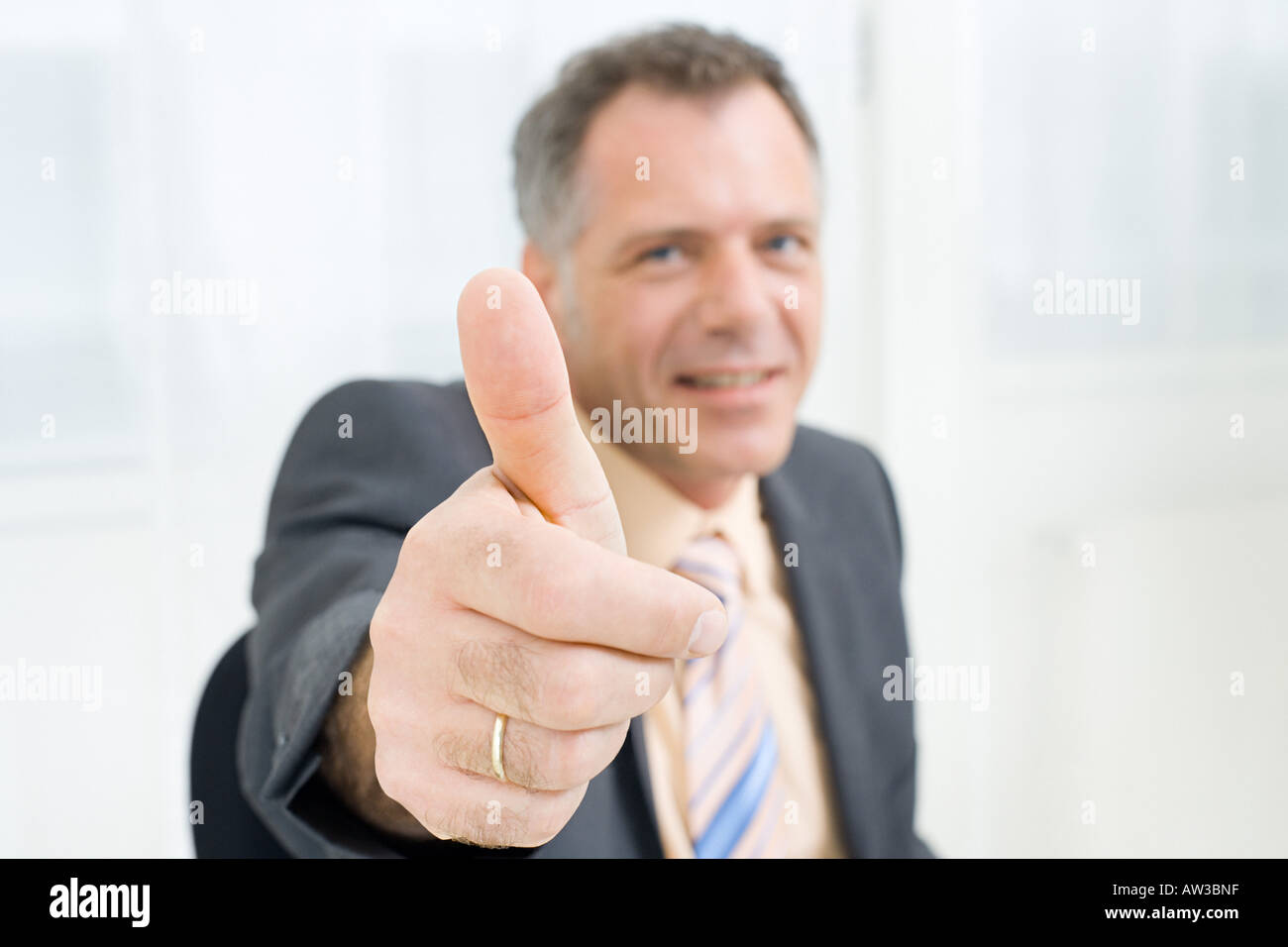 Man giving thumbs up Stock Photo