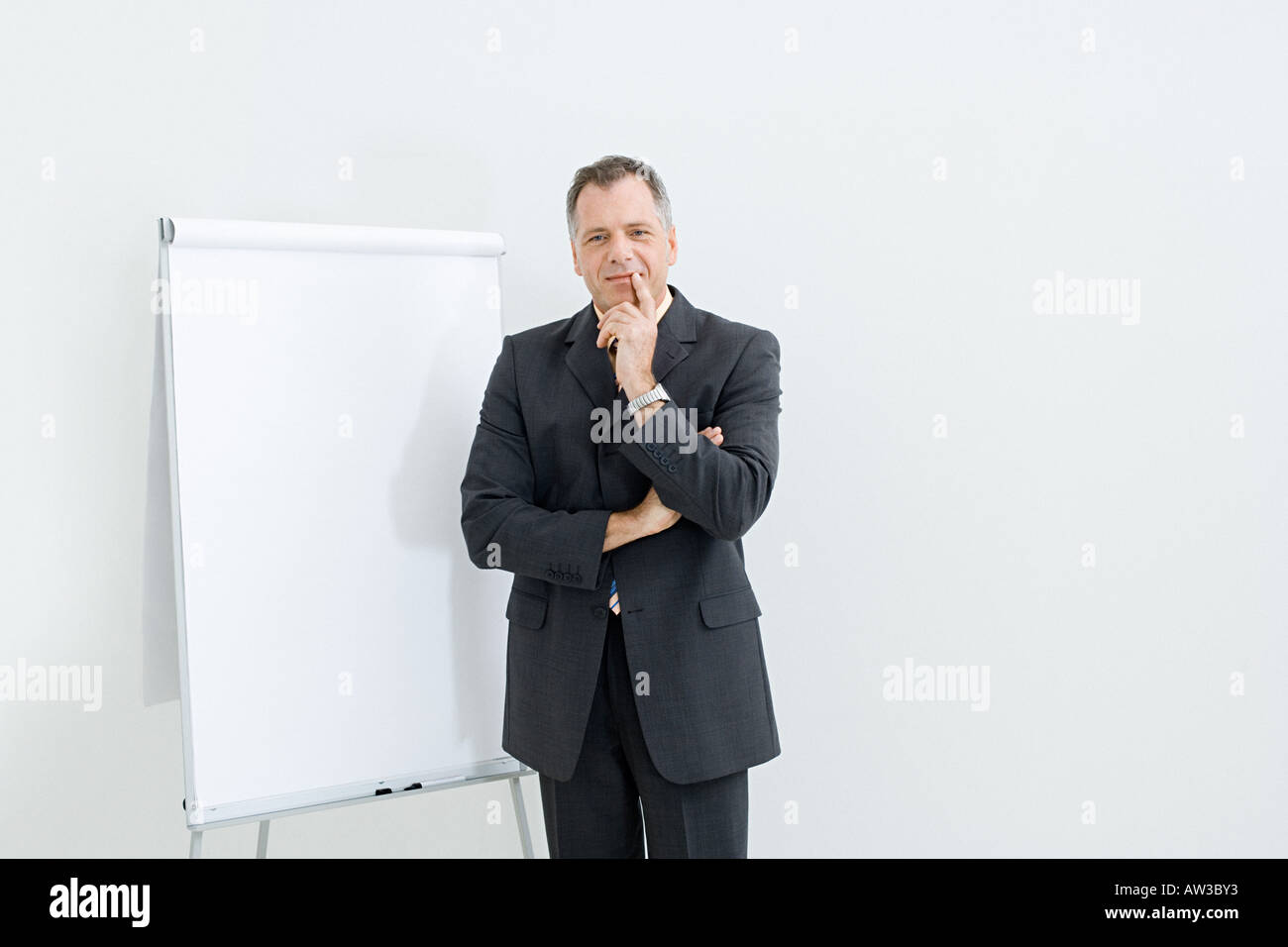Businessman and flipchart Stock Photo