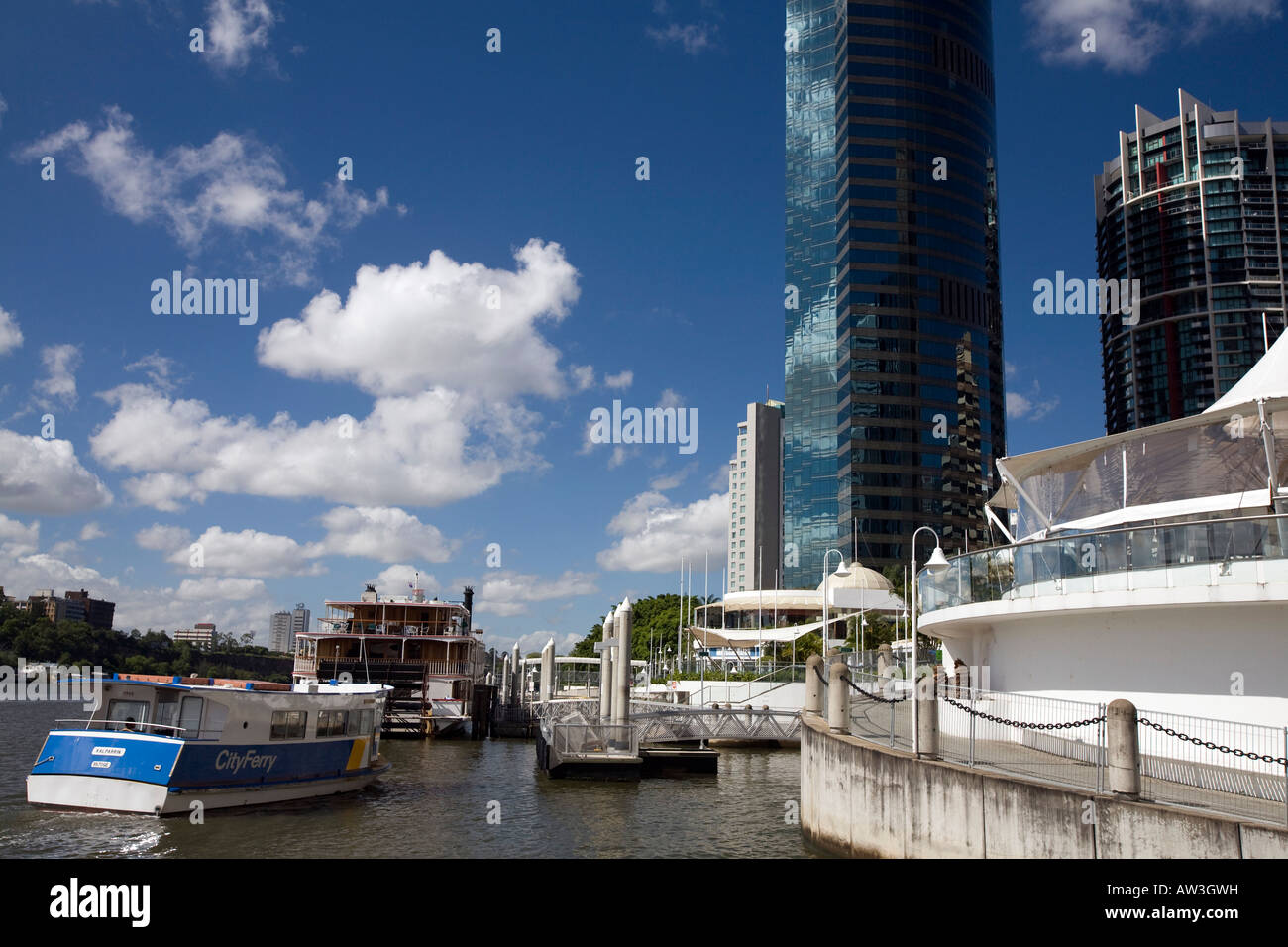 Brisbane riverside area showing ferry arriving at eagle street wharf, Stock Photo