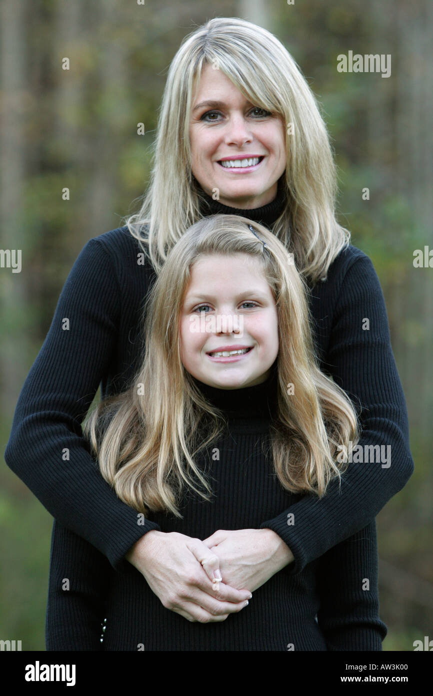 Mother daughter hugging tight hi-res stock photography and images - Alamy