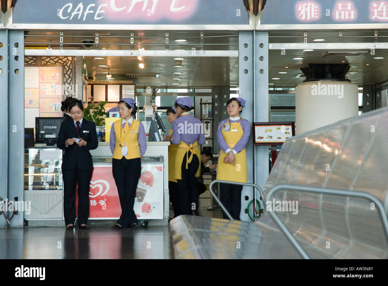 Cafe Waitresses, departure lounge, Pudong Airport Shanghai Stock Photo