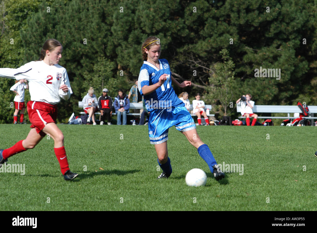 High school soccer player dribbles ball down field Stock Photo Alamy
