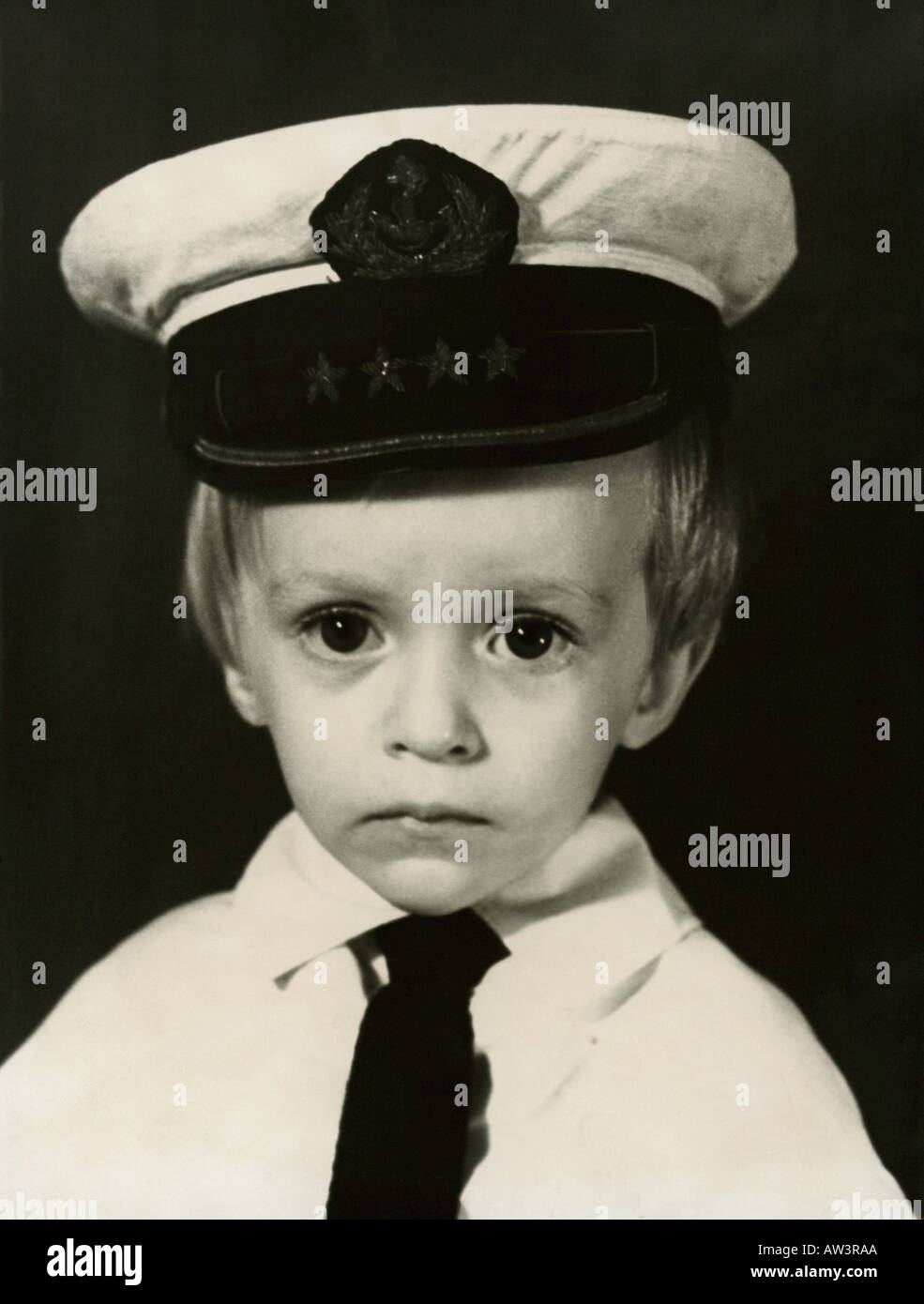 Little boy wearing captain outfit, Poland Stock Photo