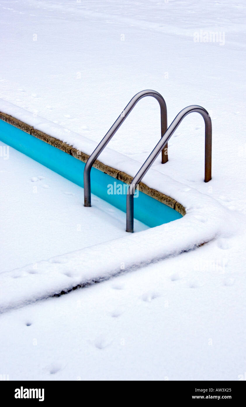 Frozen swimming pool in winter Stock Photo