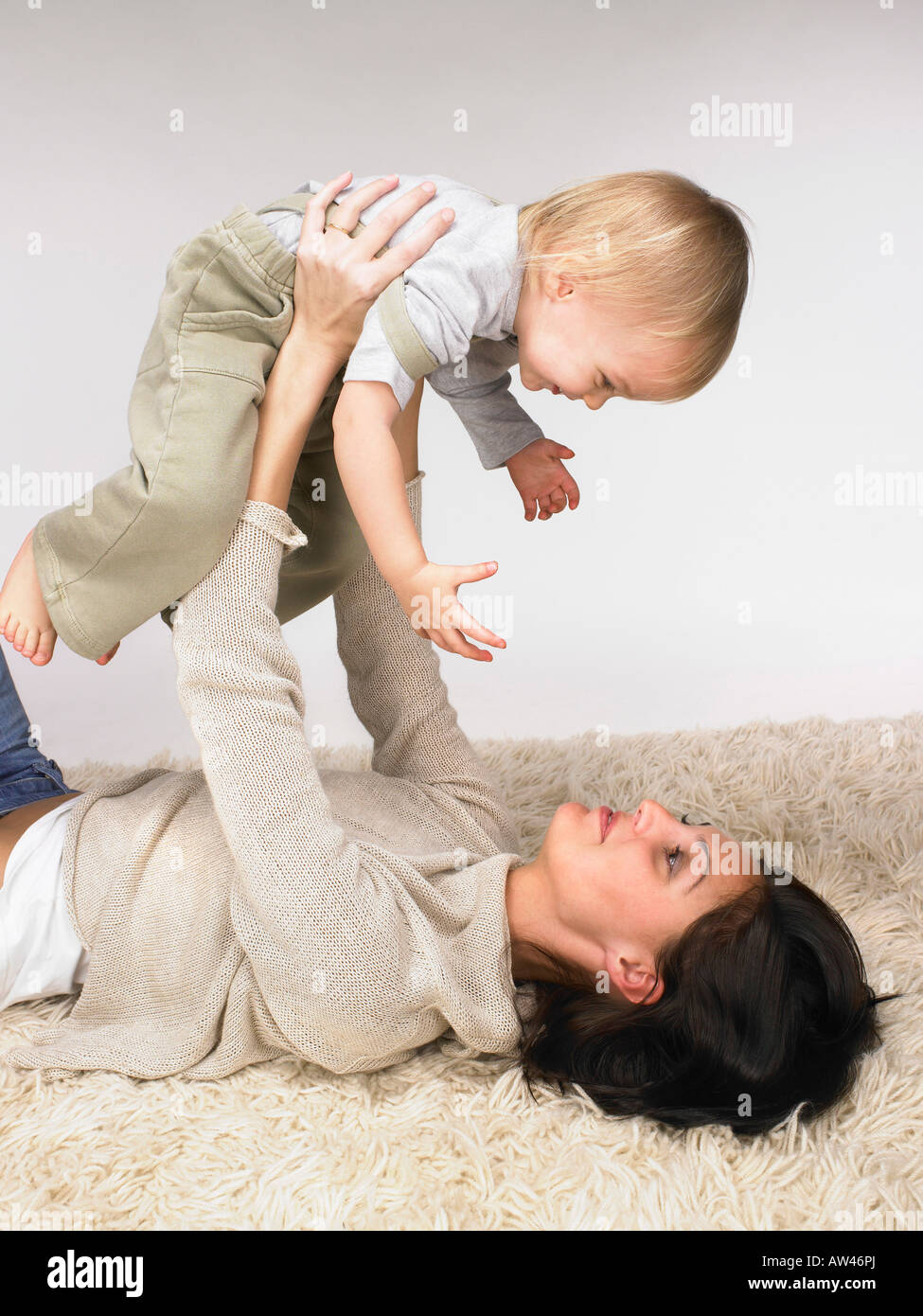 Daughter and mother playing. Stock Photo