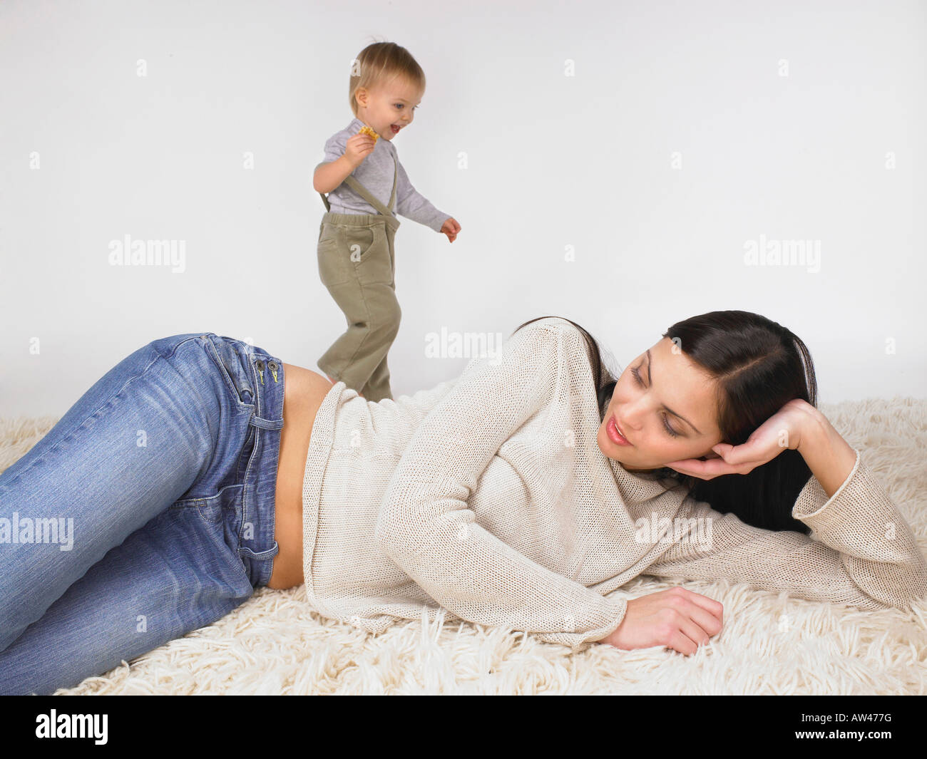 Daughter and mother playing. Stock Photo