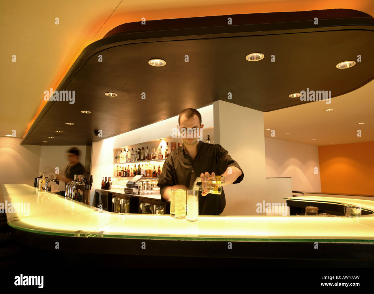 bartender serving drinks Stock Photo