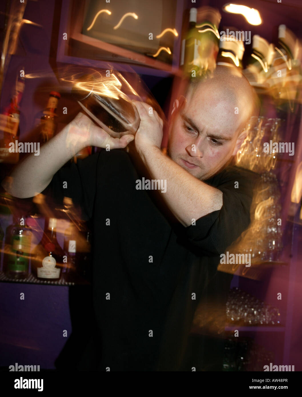 Bartender shaking a cocktail Stock Photo Alamy