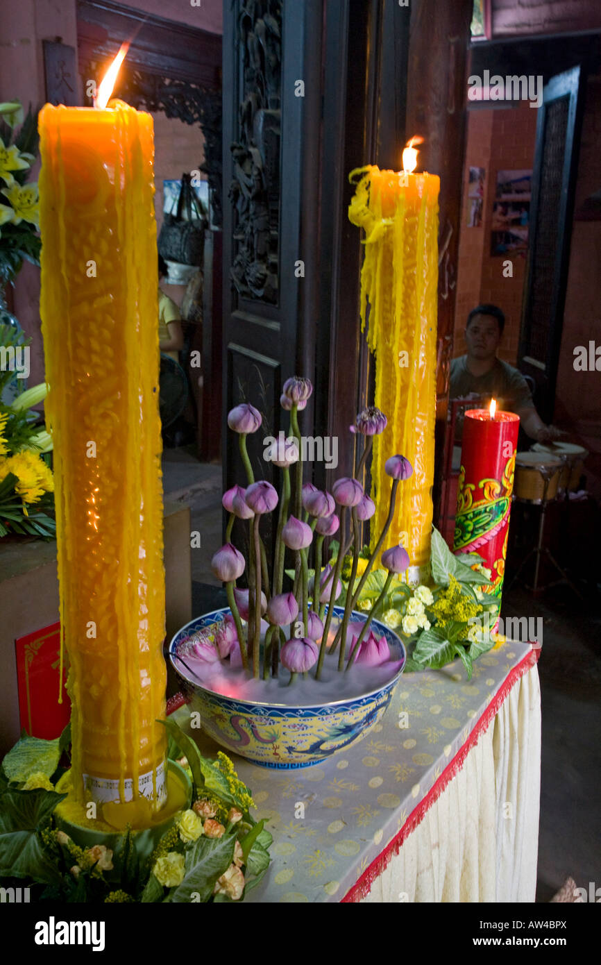 Candles burn in the entrance of the CANTONESE built JADE EMPEROR PAGODA