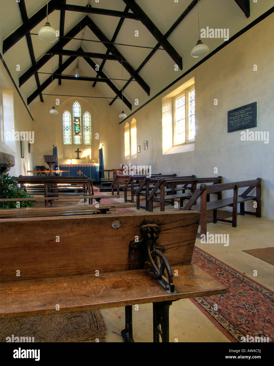 Simple Small Village Church Interior With Wooden Pews And