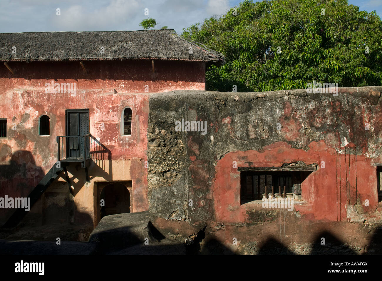 Africa Kenya Mombasa Morning sun lights red walls inside Fort Jesus a