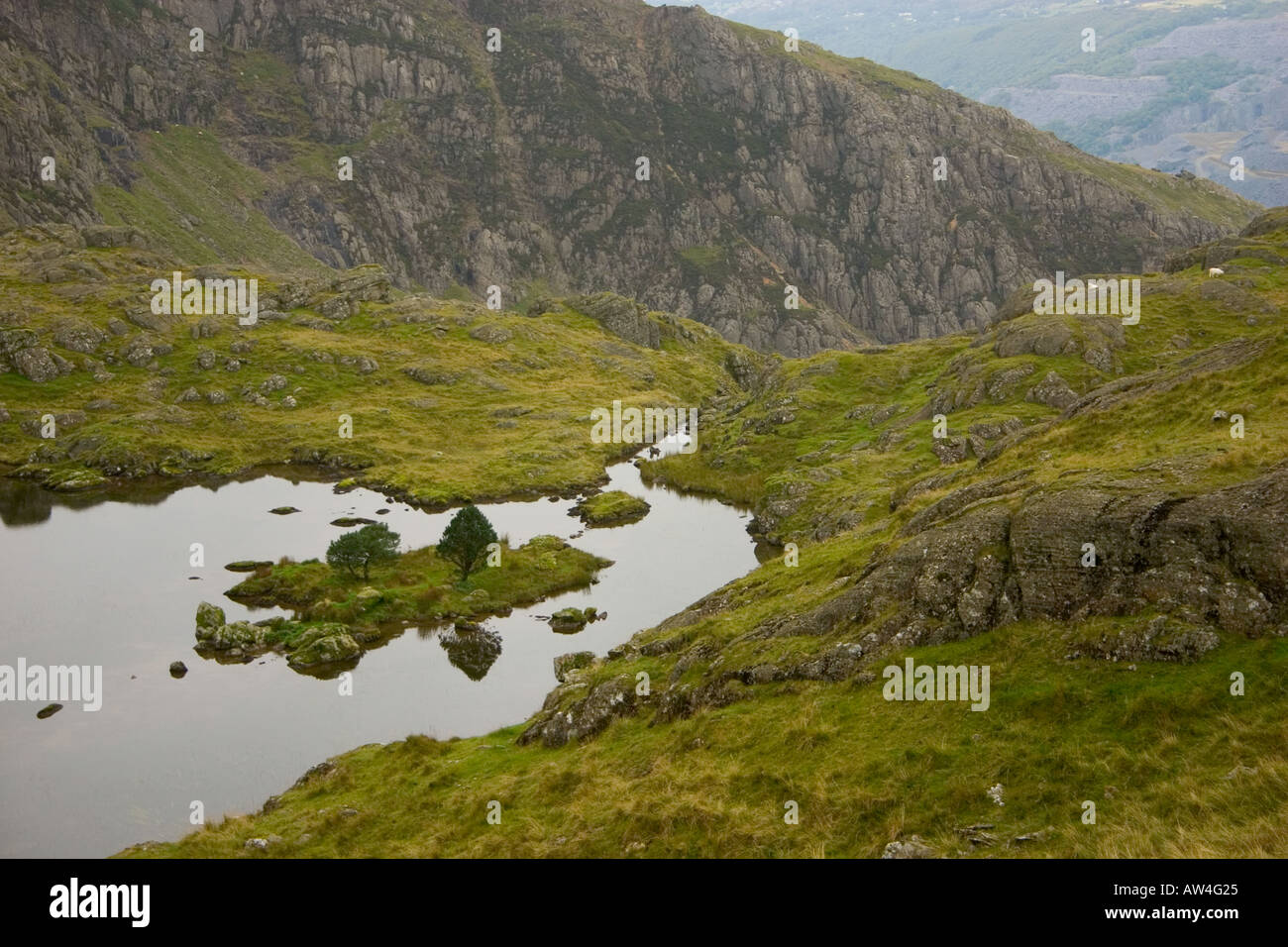 Small mountain lake on the slopes of Crib Goch Stock Photo