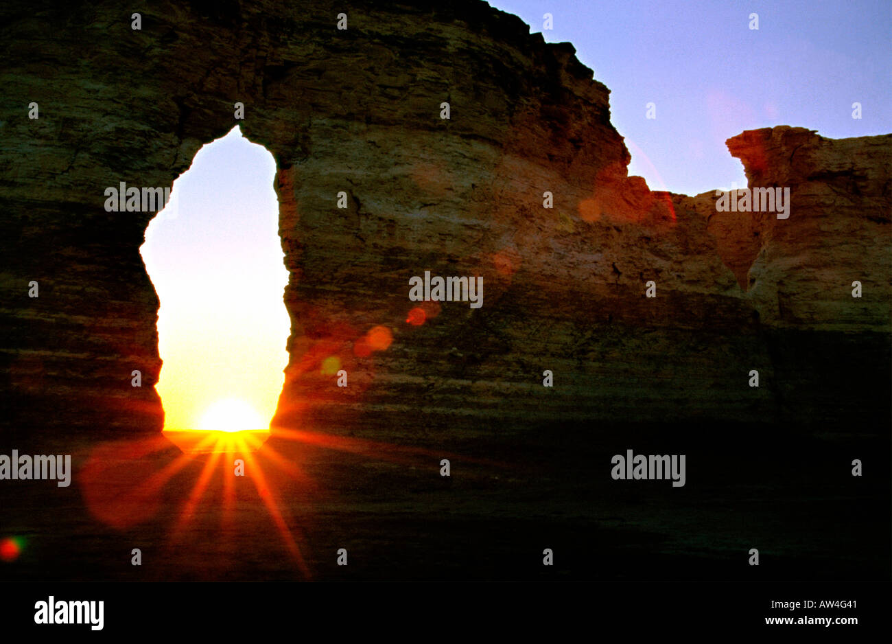 Sun setting through keyhole monument hi-res stock photography and ...