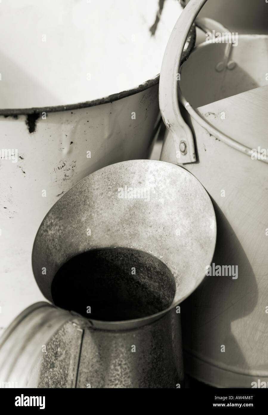 Metal objects; jug, bucket and a watering can Stock Photo