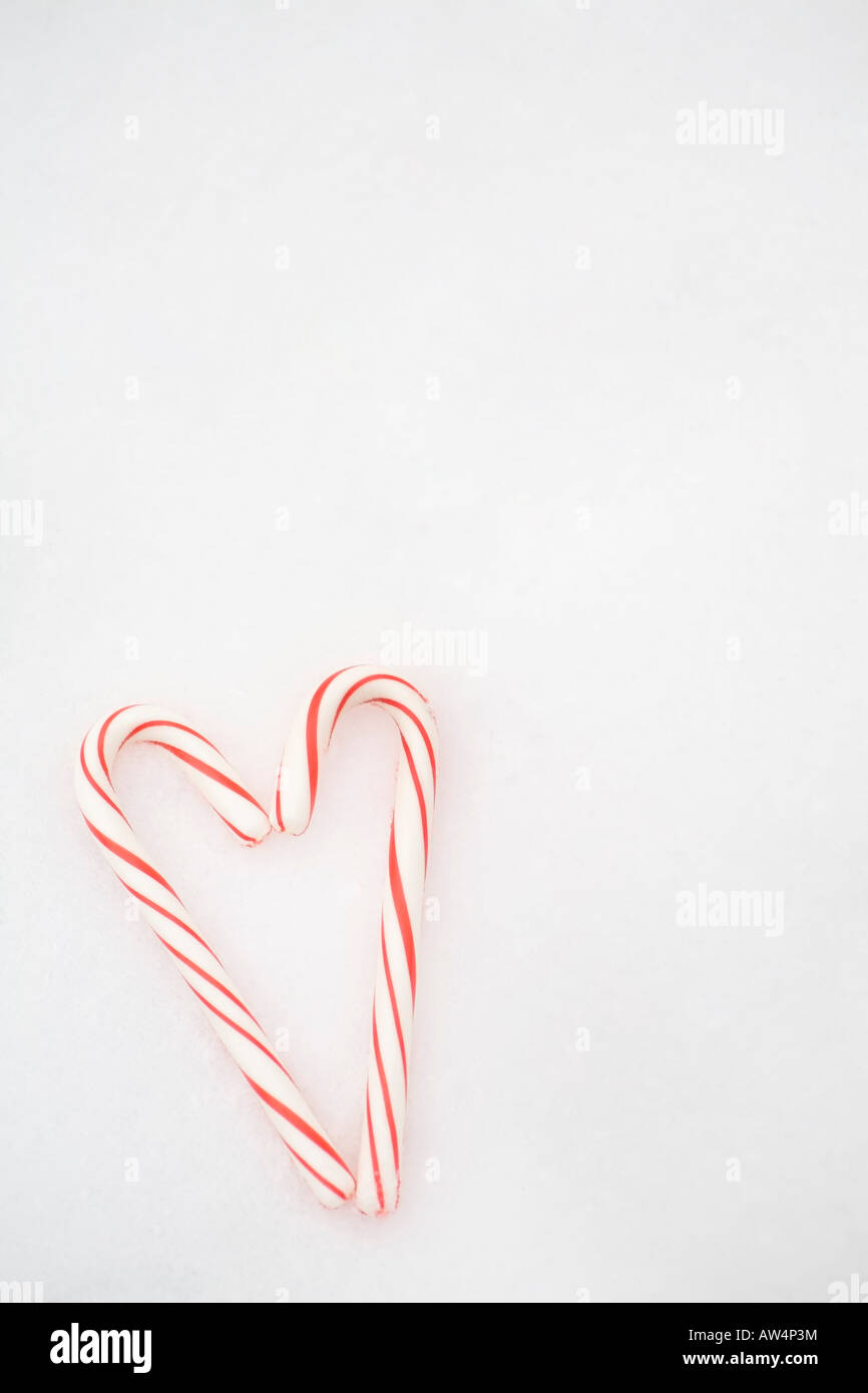 Candy canes forming a heart Stock Photo