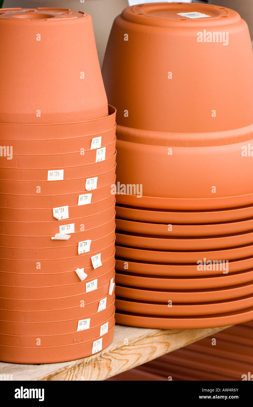 Stack of flower pots for sale at garden center Stock Photo Alamy