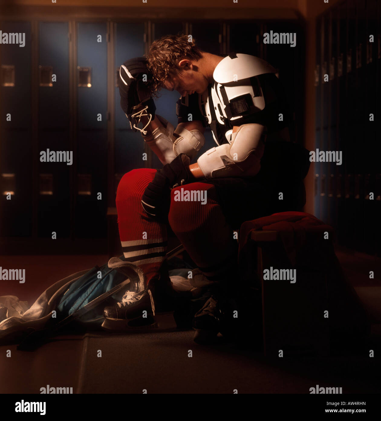 Hockey player in dressing room Stock Photo Alamy